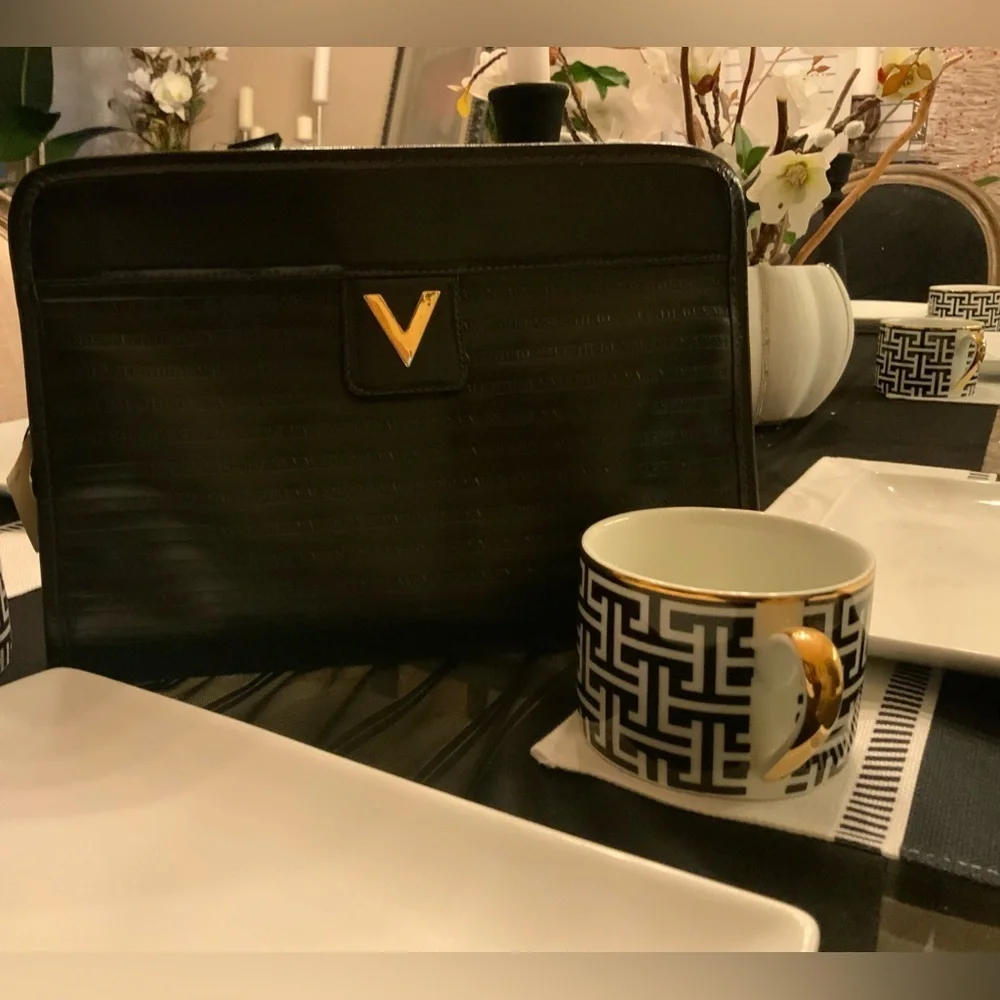 VGT Mario Valentino authentic. Black classy clutch/purse Gold Detail “Host Pick”